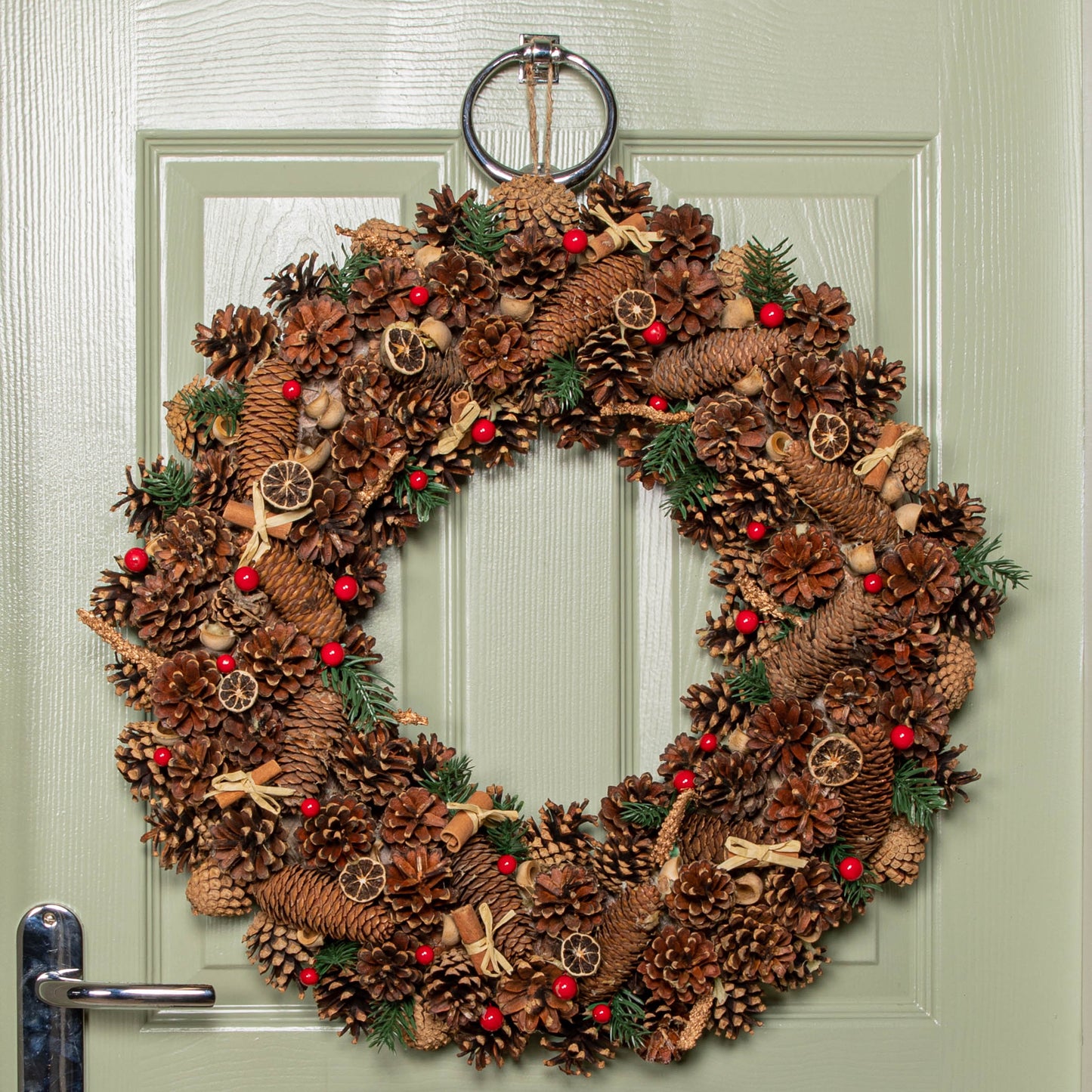 60cm Winter Spice Hanging Christmas Wreath with Pine Cones Red Berries & Dried Fruit