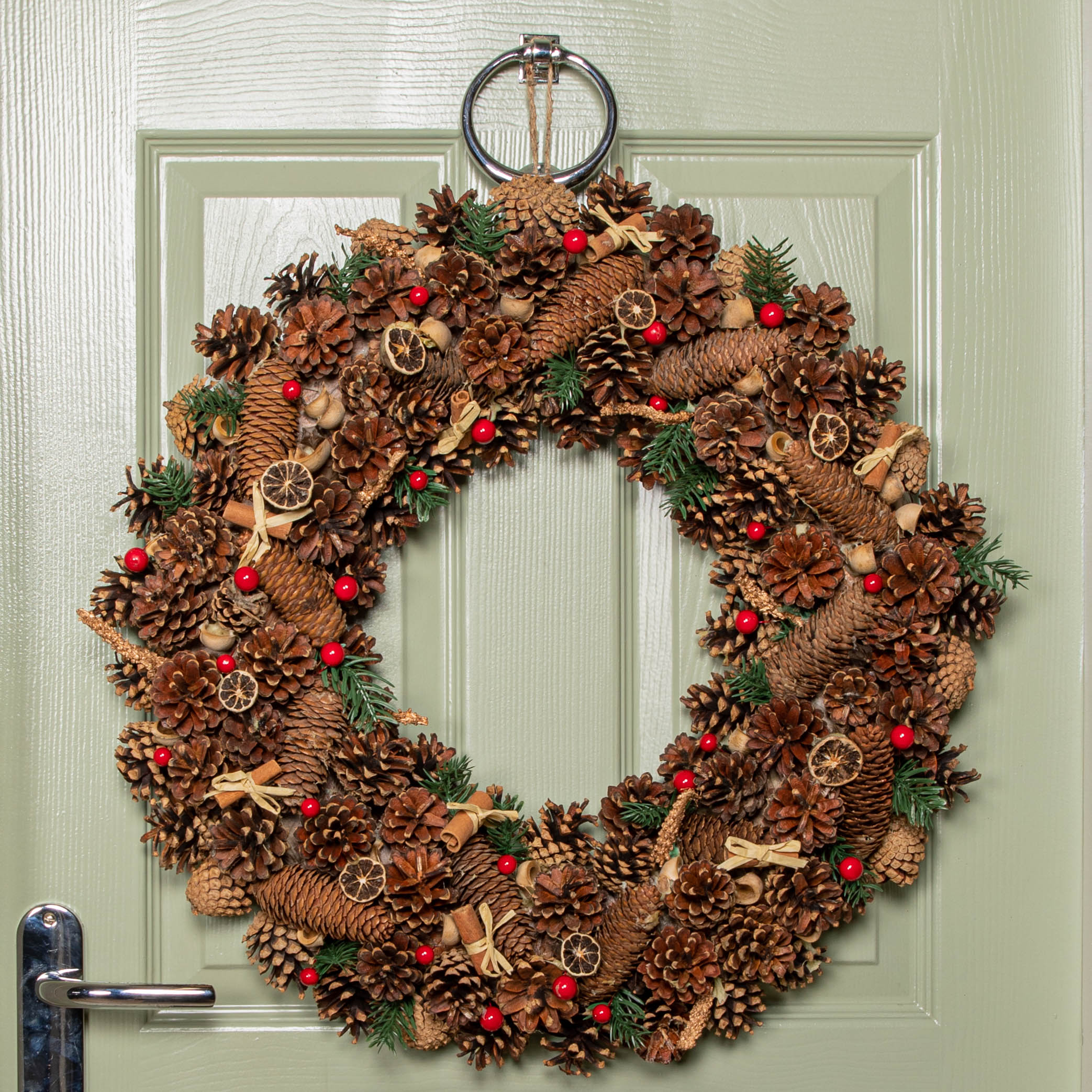 60cm Winter Spice Hanging Christmas Wreath with Pine Cones Red Berries & Dried Fruit