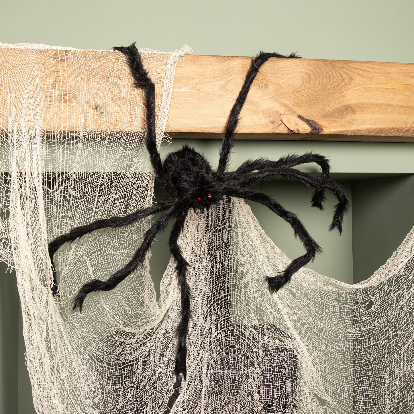 90cm Black Furry Halloween Spider Decoration with Extendable Legs and Red Eyes