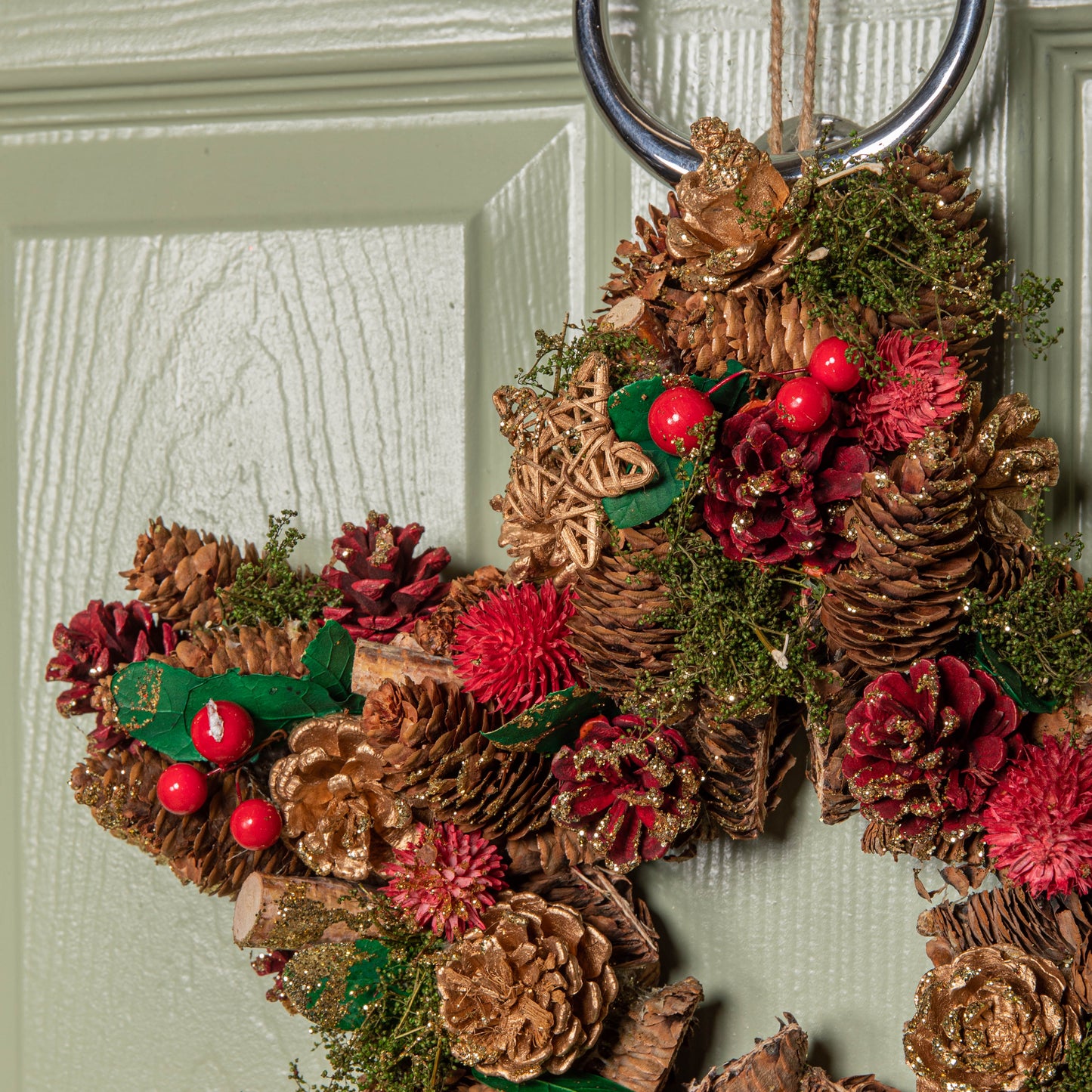 35cm Red Hanging Star Christmas Wreath with Red Berries and Pinecones 