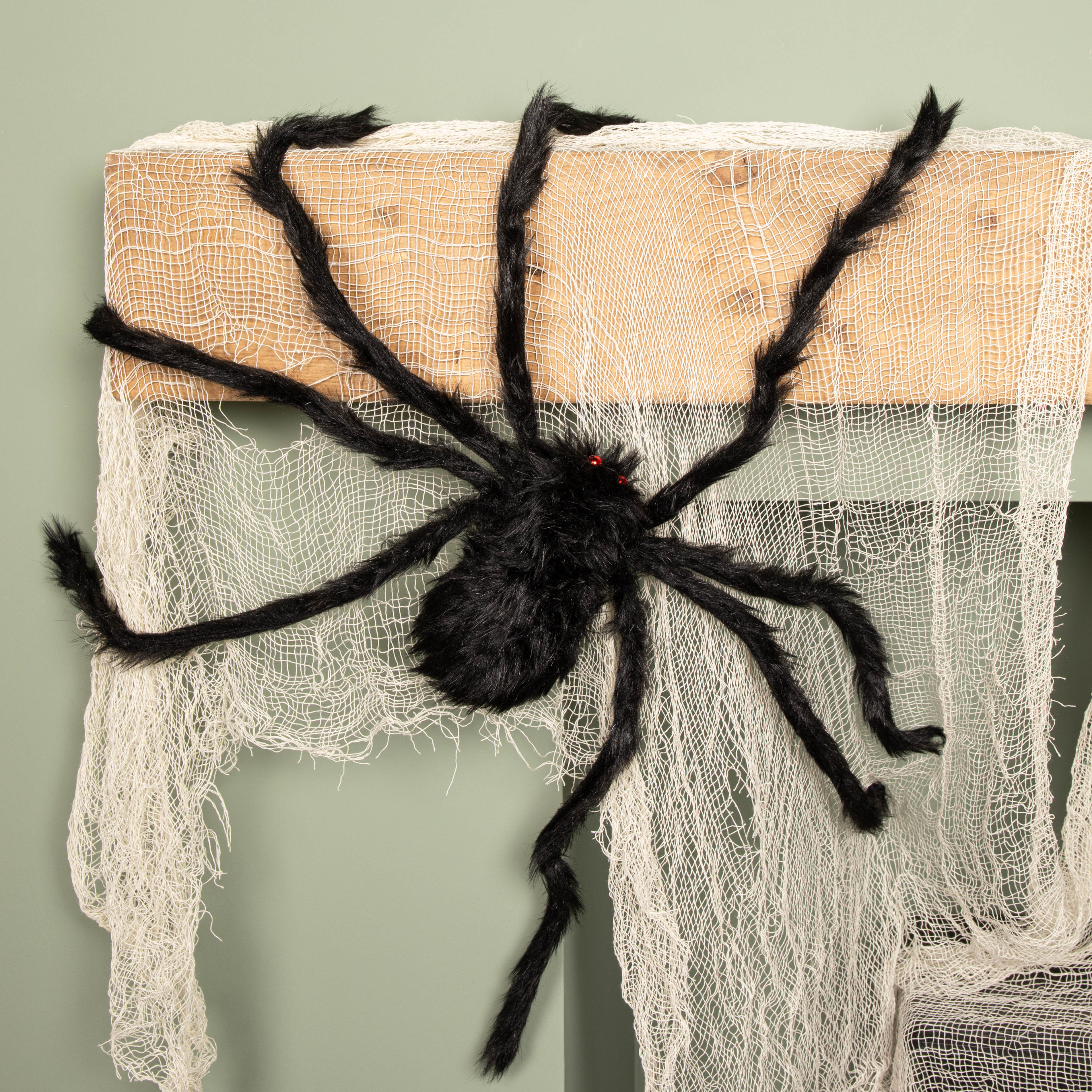 90cm Black Furry Halloween Spider Decoration with Extendable Legs and Red Eyes