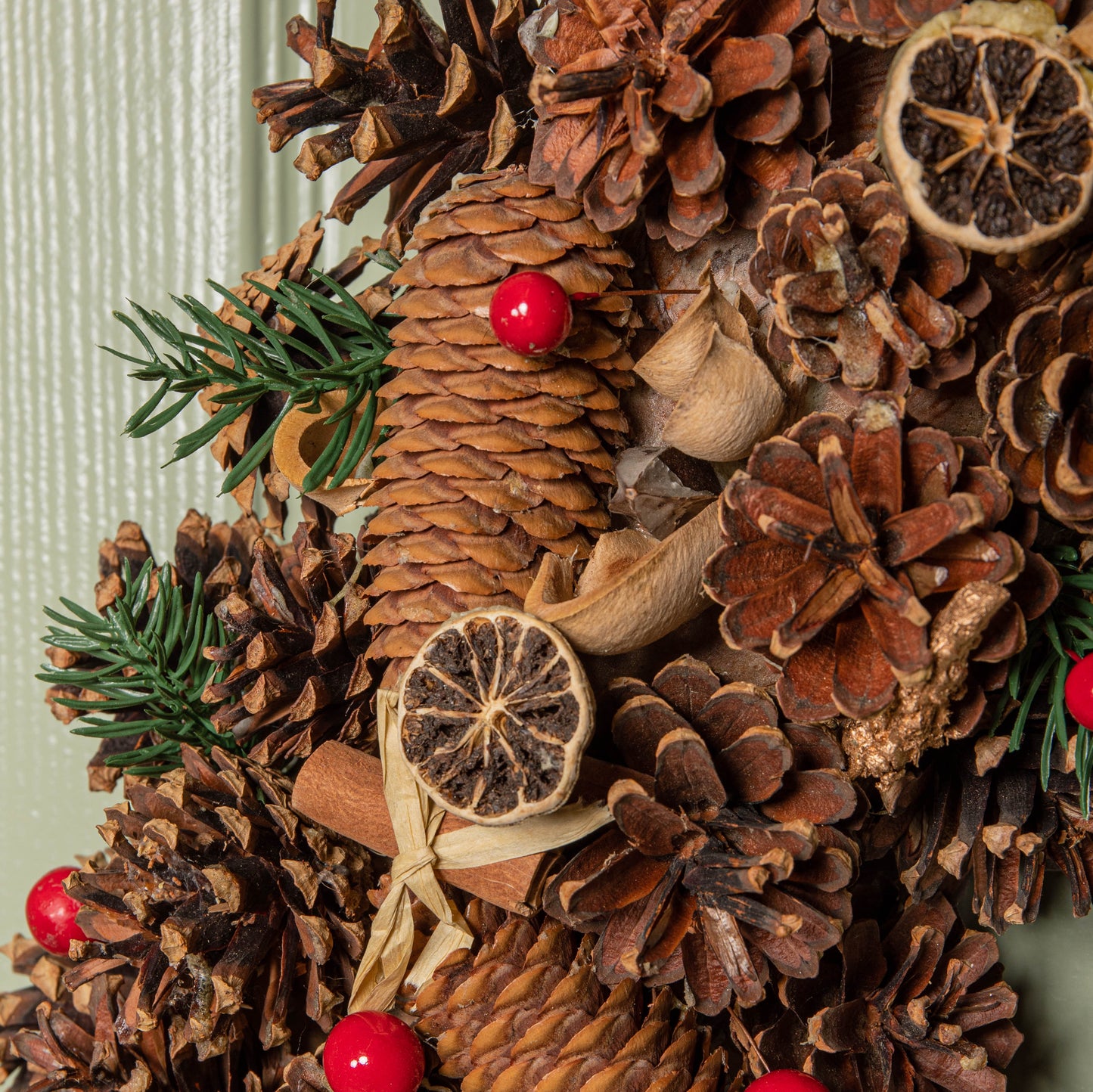 60cm Winter Spice Hanging Christmas Wreath with Pine Cones Red Berries & Dried Fruit