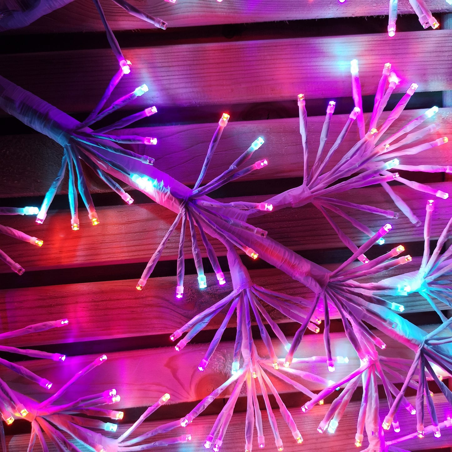 1.2m Twinkling Starburst Snowflake Christmas decoration with 960 Rainbow LEDs