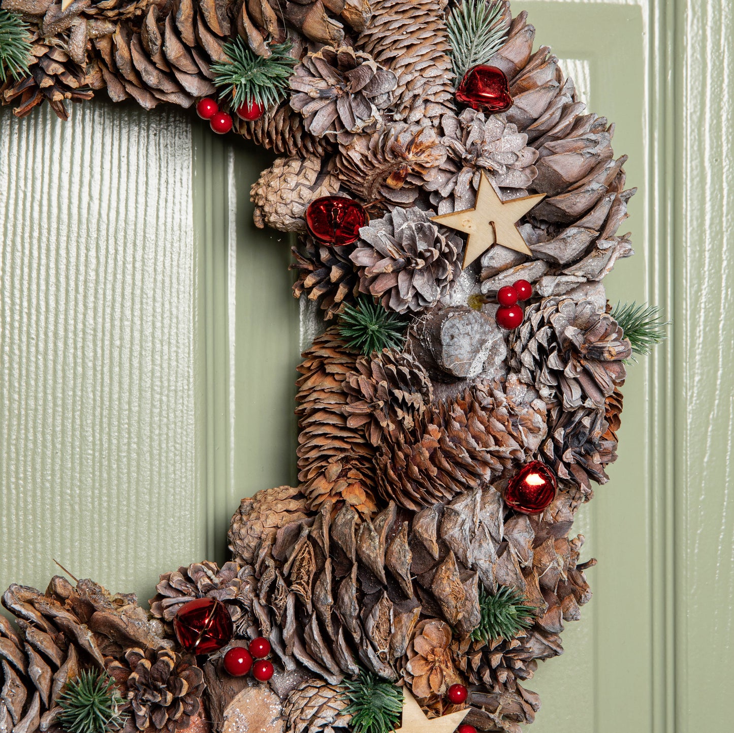 50cm Frosted Hanging Christmas Wreath with Red Jingle Bells & Wooden Stars