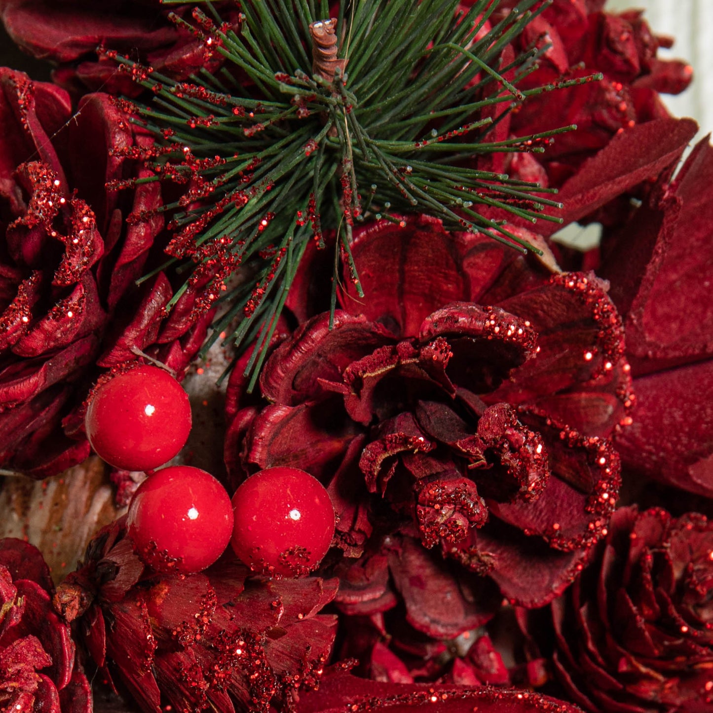 35cm Ruby Pine Hanging Christmas Star Wreath with Red Pinecones and Berries