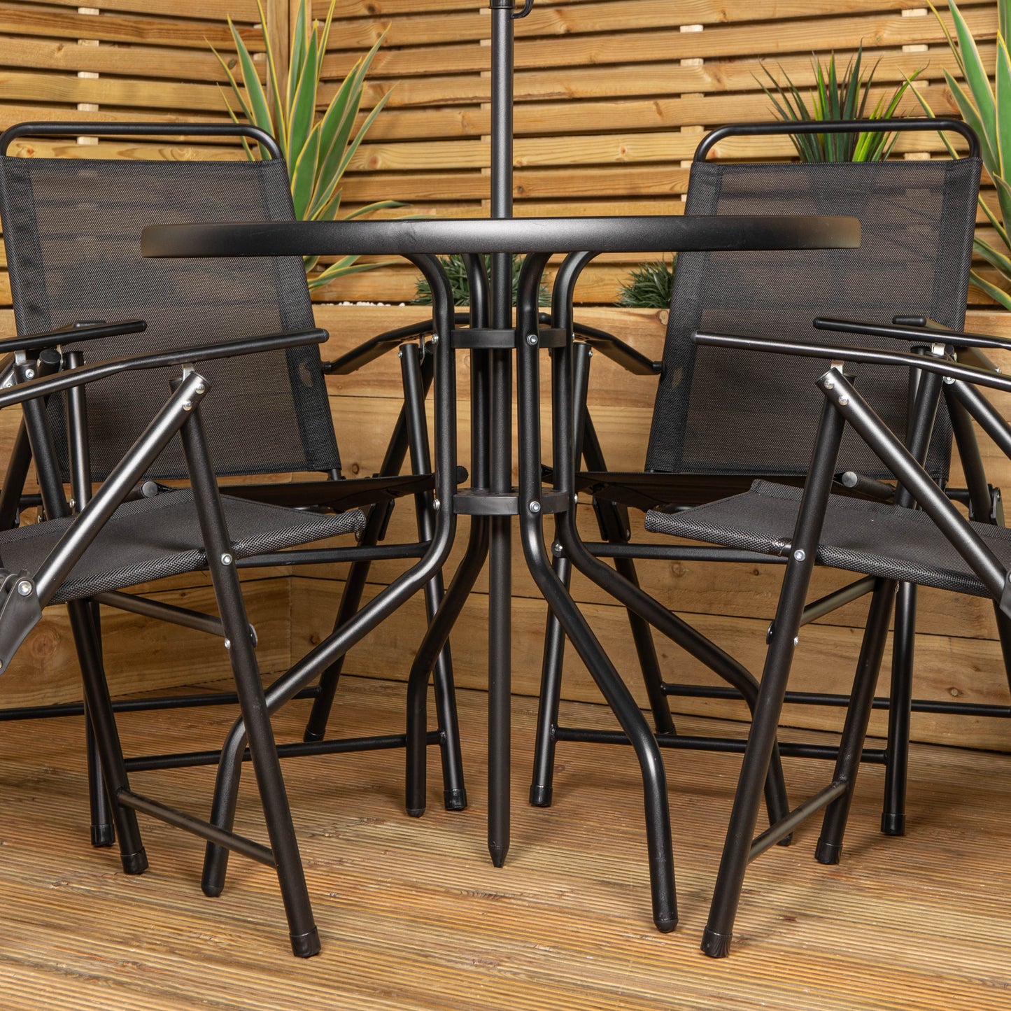 Samuel Alexander Outdoor 4 Seater Round Glass Top Table and Chairs Patio Set with Parasol in Black