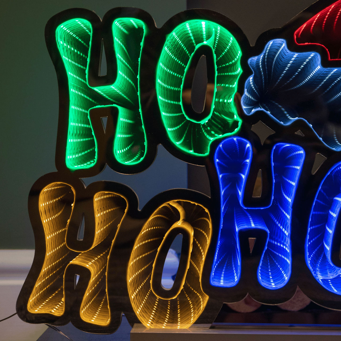 40cm Infinity Ho Ho Ho on Metal Base with Multi-Coloured LEDs