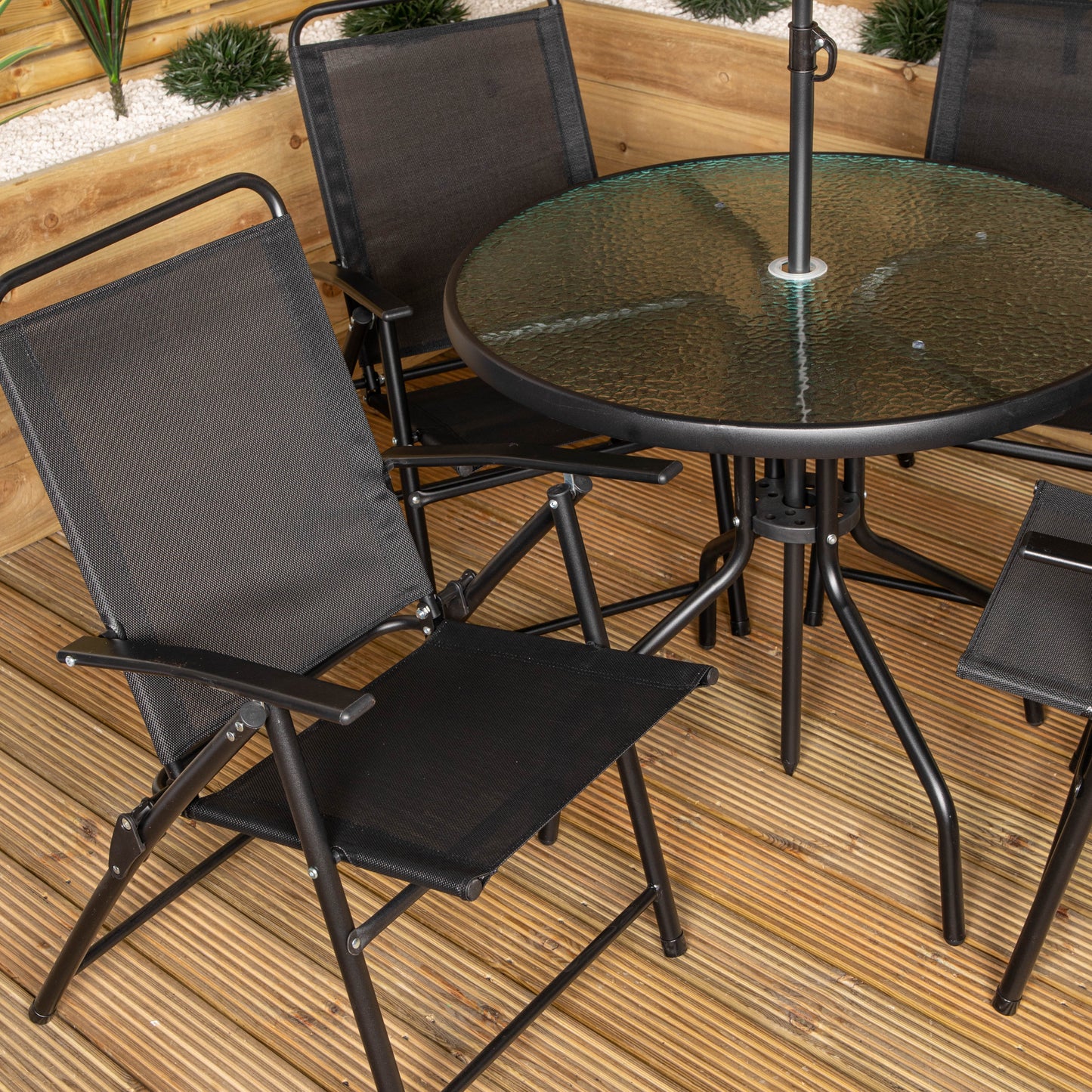 Samuel Alexander Outdoor 4 Seater Round Glass Top Table and Chairs Patio Set with Parasol in Black