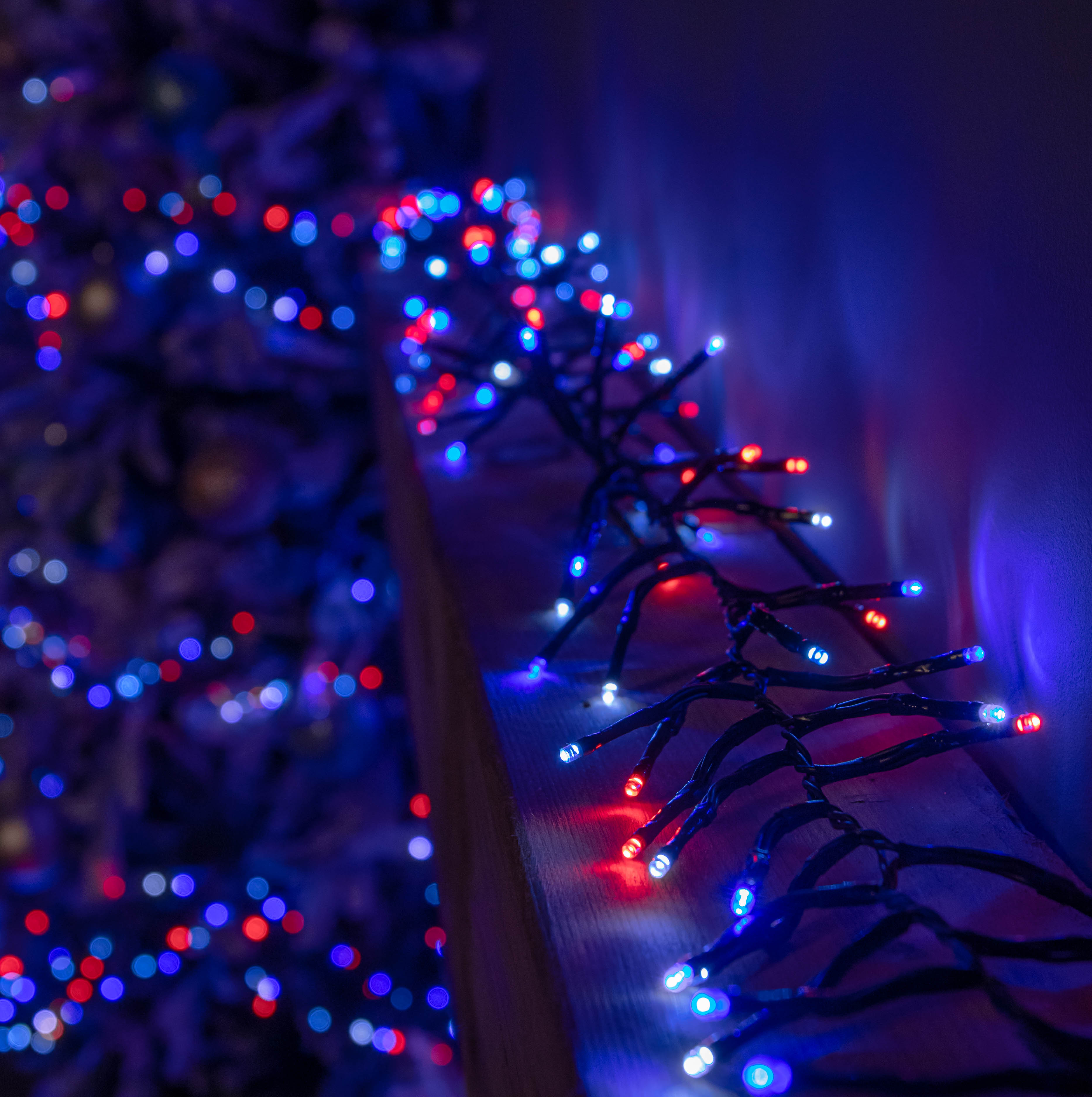 62.5m 5000 LED Christmas Cluster Multi-Action String Lights with Timer in Blue, Red & White