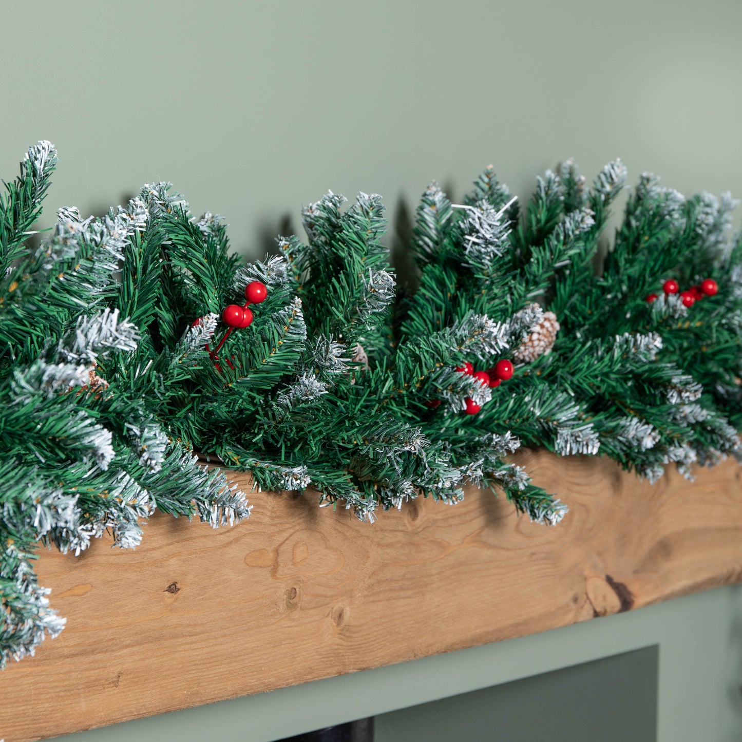 2.7m Snow Tipped Christmas Garland with Red Berries, Cones & Bullet Tips