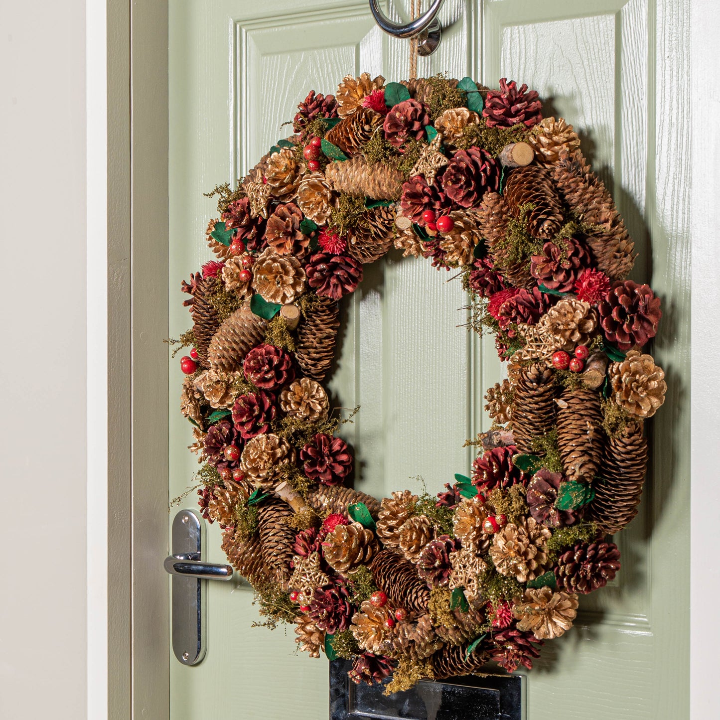 60cm Red Hanging Christmas Wreath with Red Berries and Pinecones 