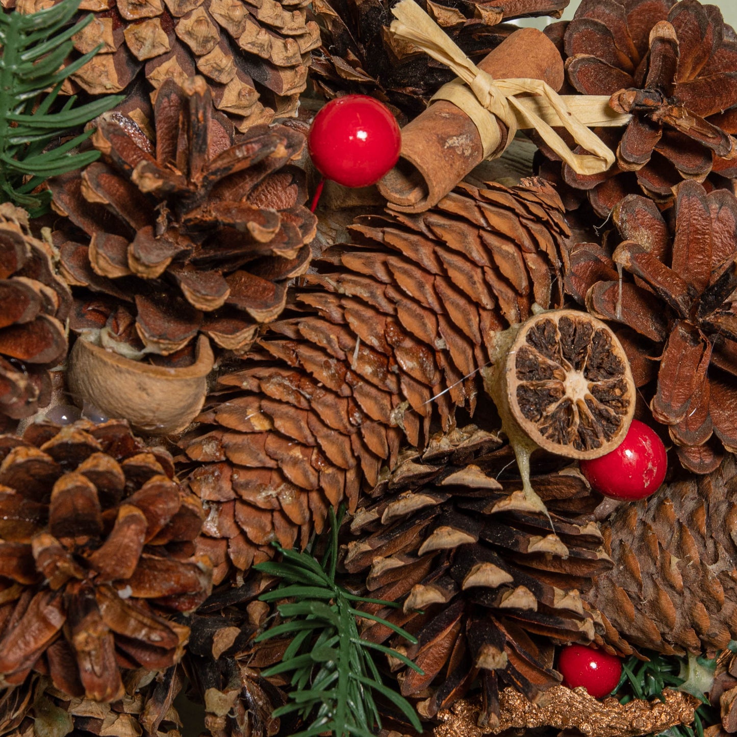 60cm Winter Spice Hanging Christmas Wreath with Pine Cones Red Berries & Dried Fruit