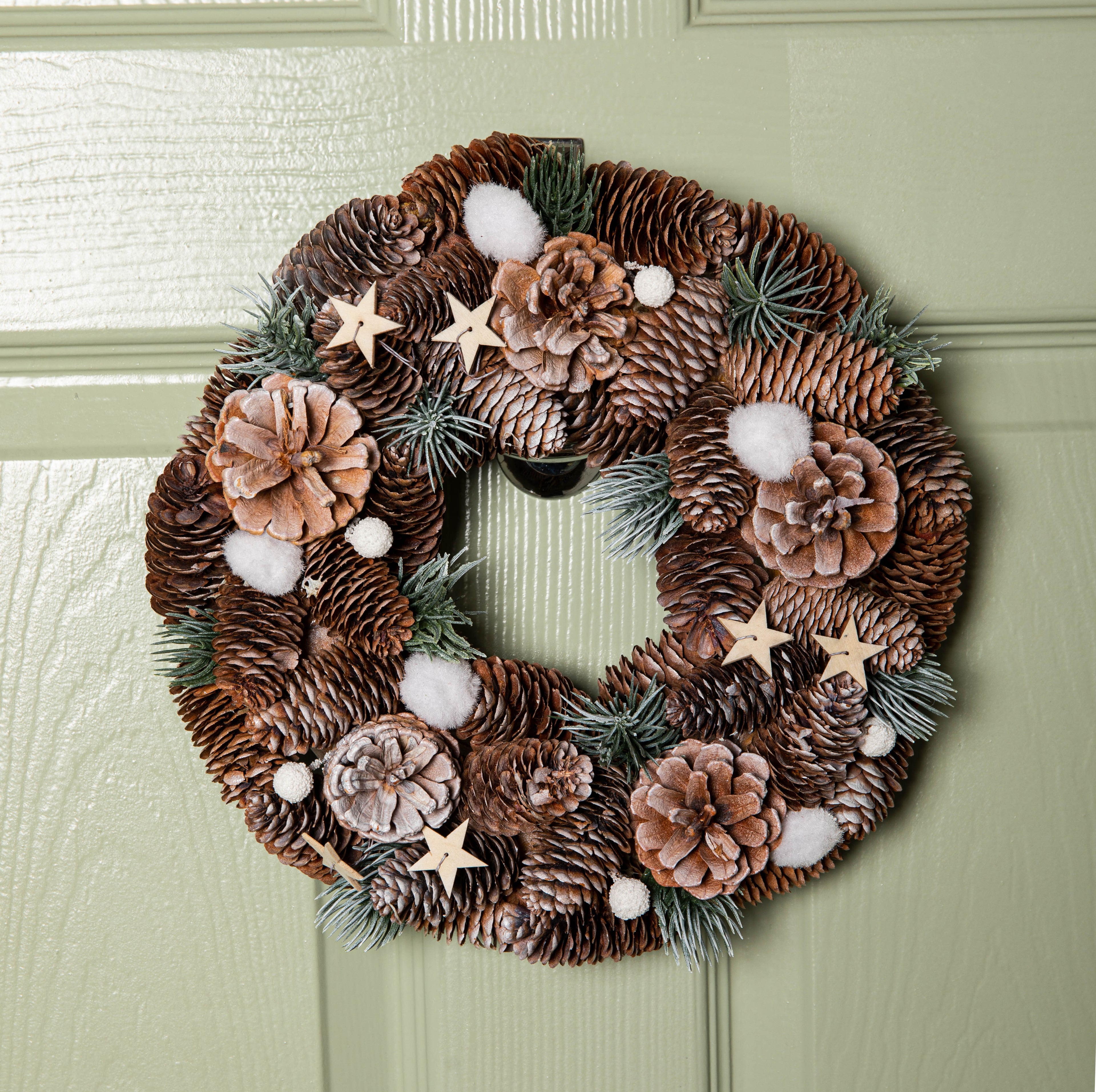 30cm Frosted Hanging Christmas Wreath with Pine Cones & Wooden Stars