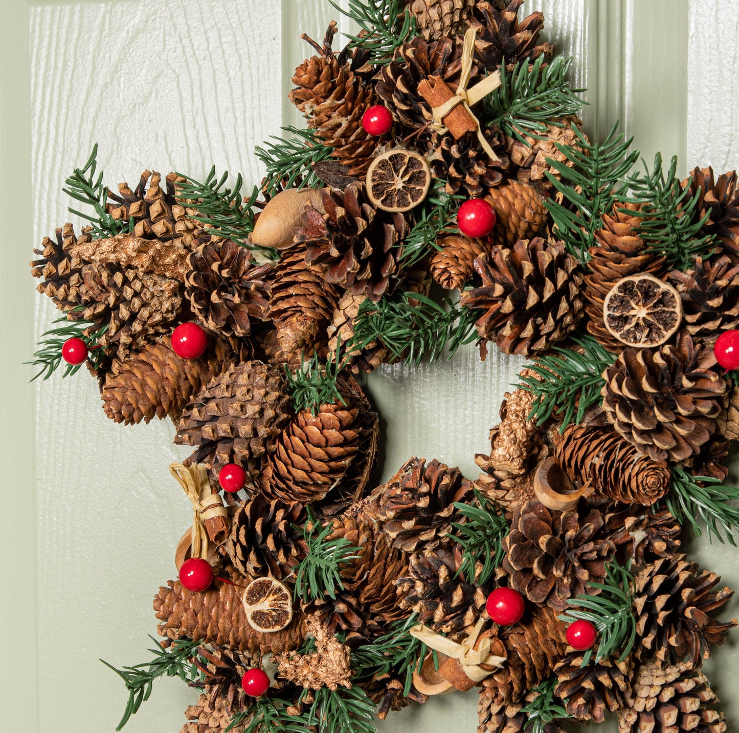 35cm Winter Spice Star Hanging Christmas Wreath with Pine Cones Red Berries & Dried Fruit