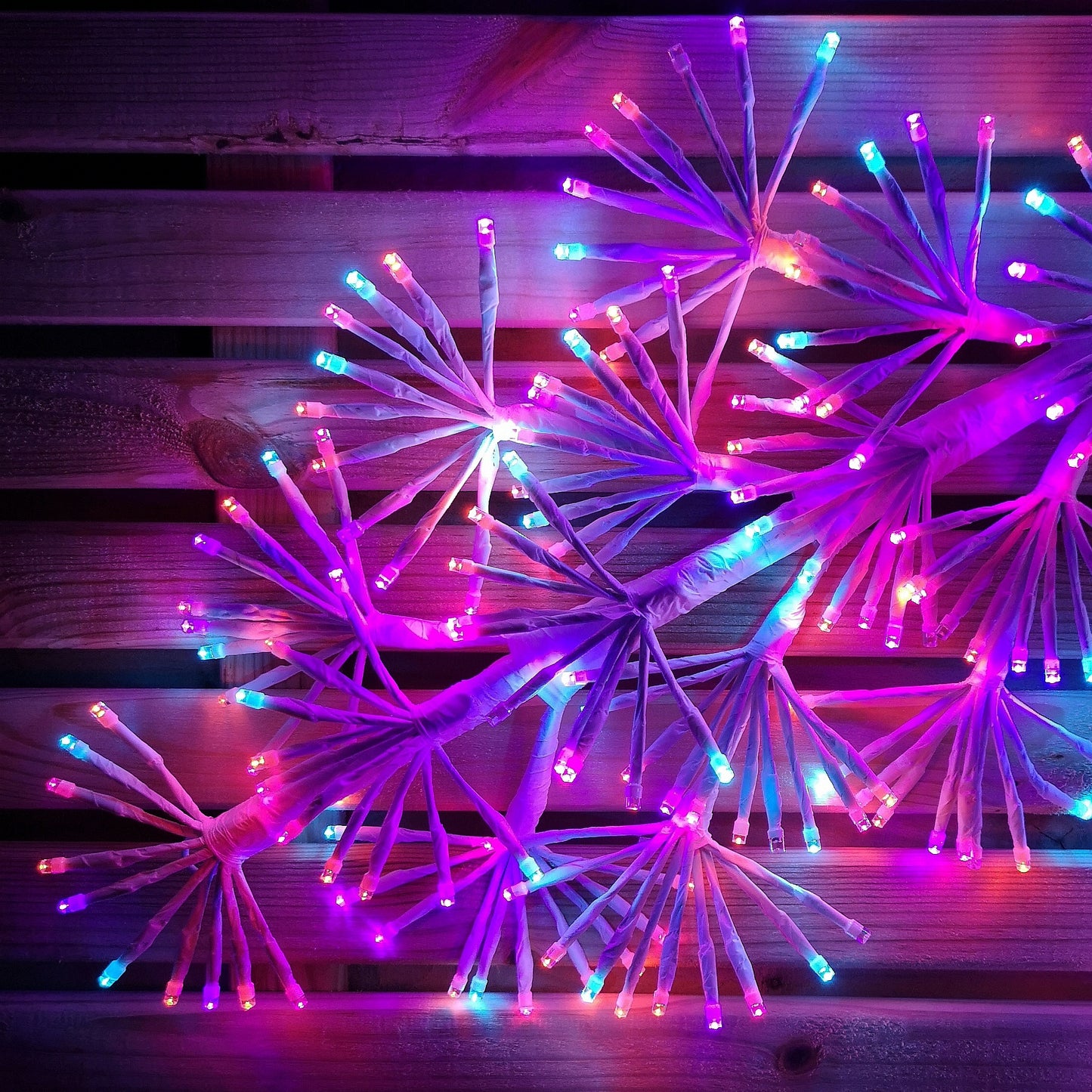 1.2m Twinkling Starburst Snowflake Christmas decoration with 960 Rainbow LEDs