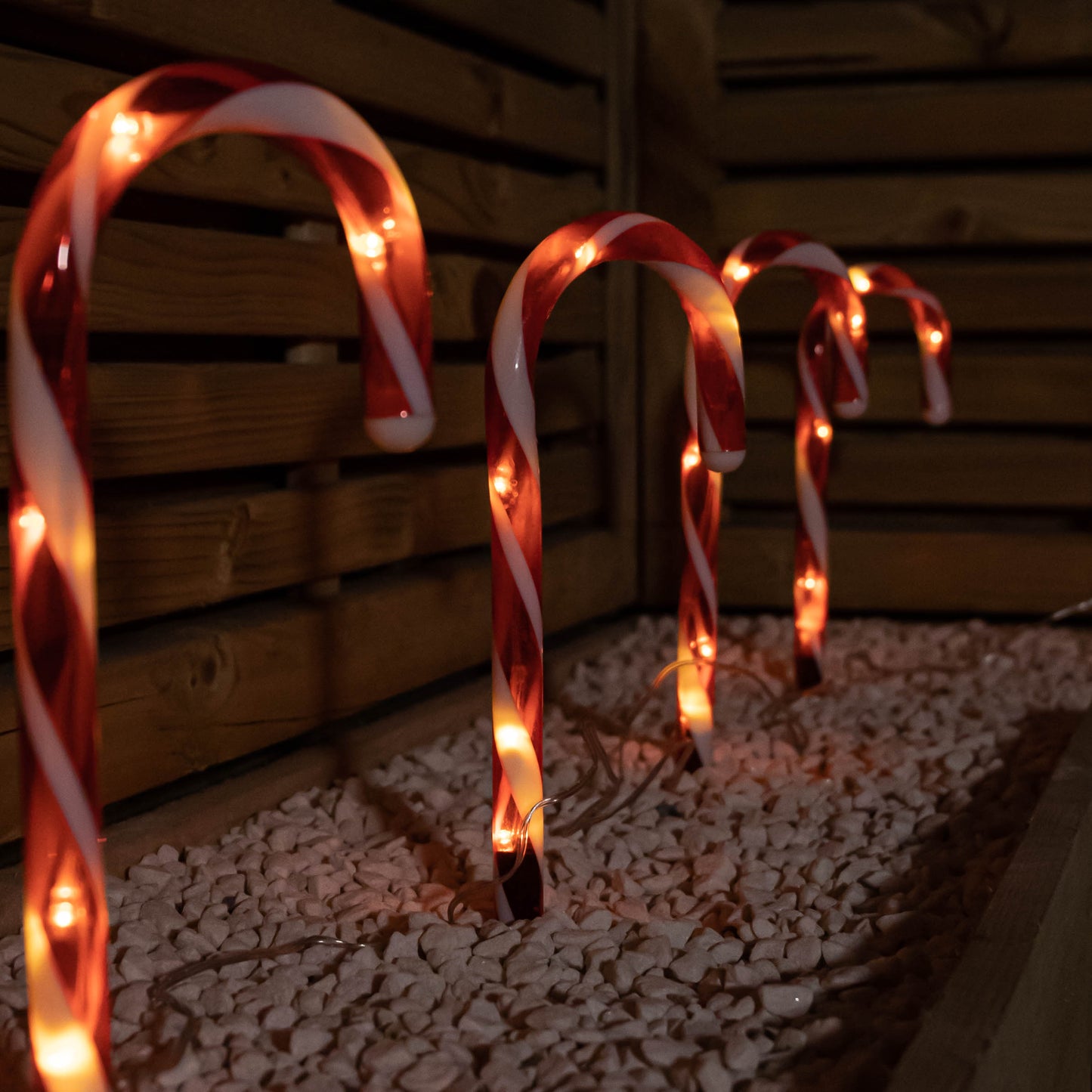 25cm Set of 12 Battery Powered Light up Christmas Candy Cane Path Lights with 60 Warm White LEDs