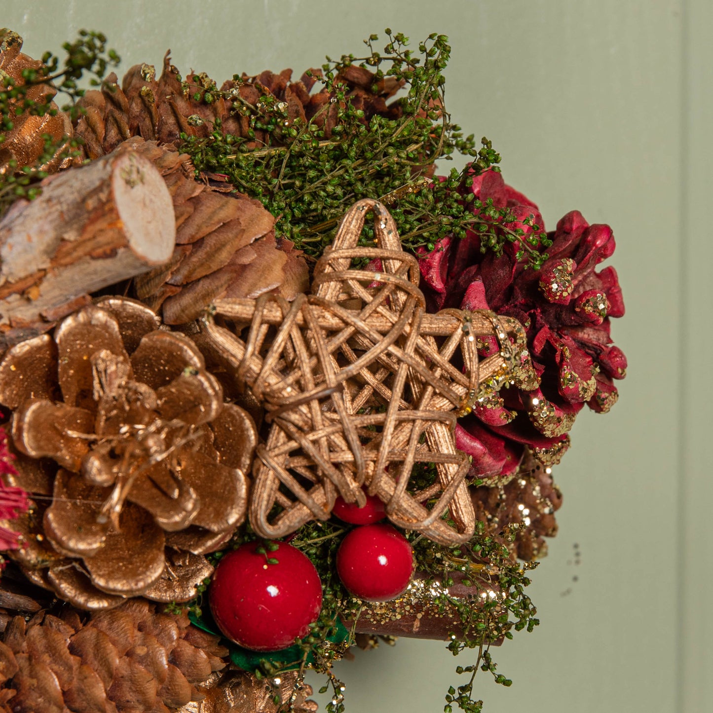 35cm Red Hanging Star Christmas Wreath with Red Berries and Pinecones 