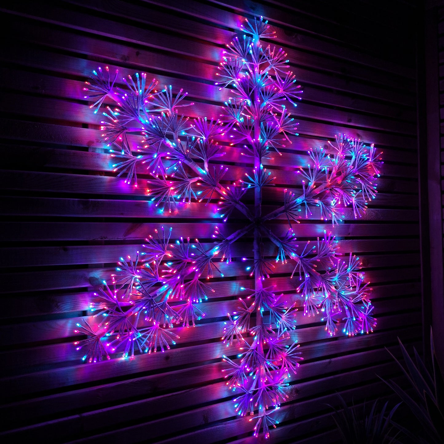 1.2m Twinkling Starburst Snowflake Christmas decoration with 960 Rainbow LEDs