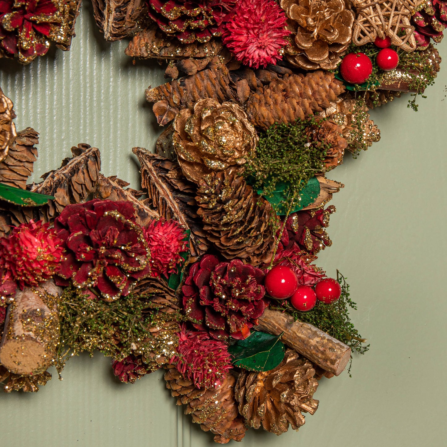 35cm Red Hanging Star Christmas Wreath with Red Berries and Pinecones 