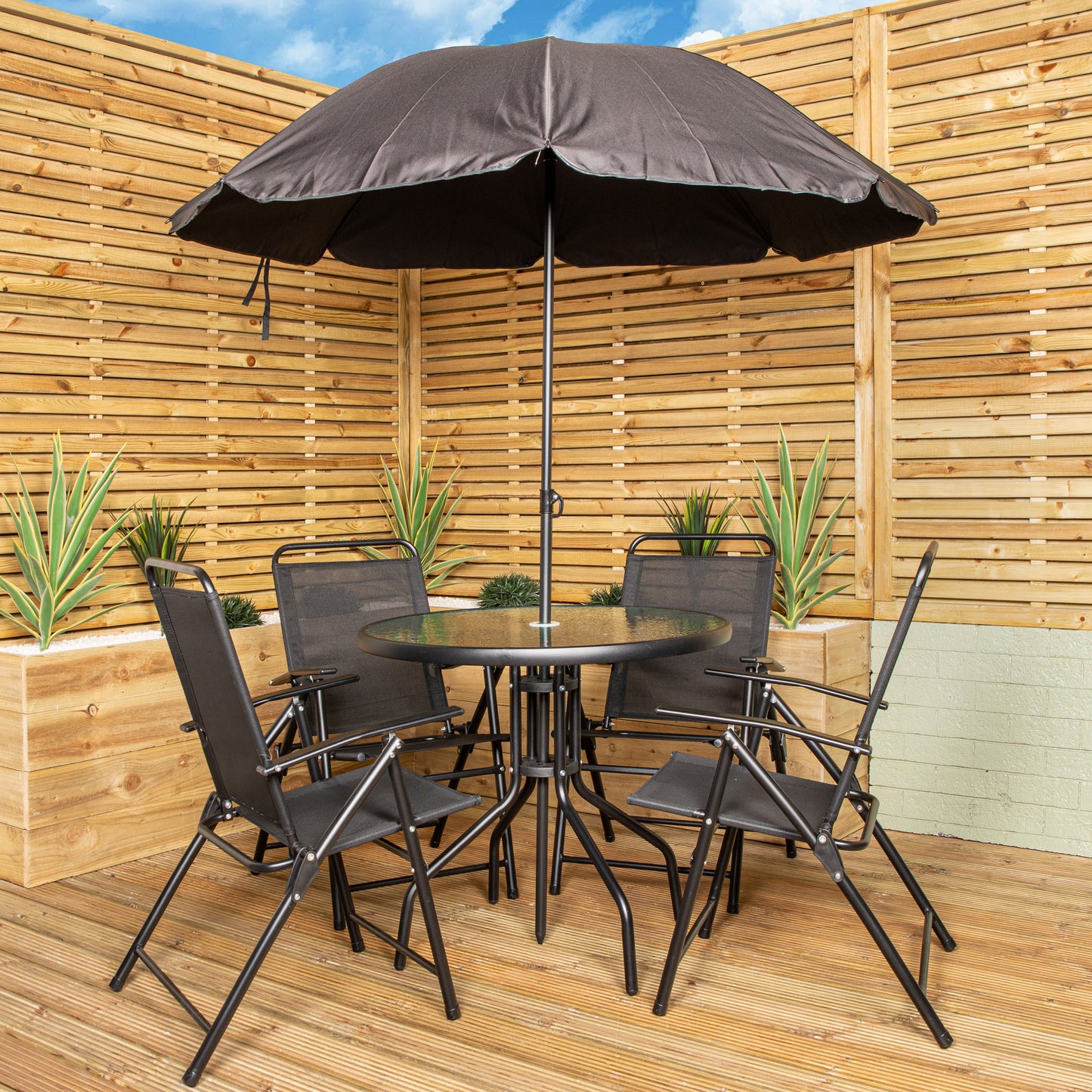 Samuel Alexander Outdoor 4 Seater Round Glass Top Table and Chairs Patio Set with Parasol in Black