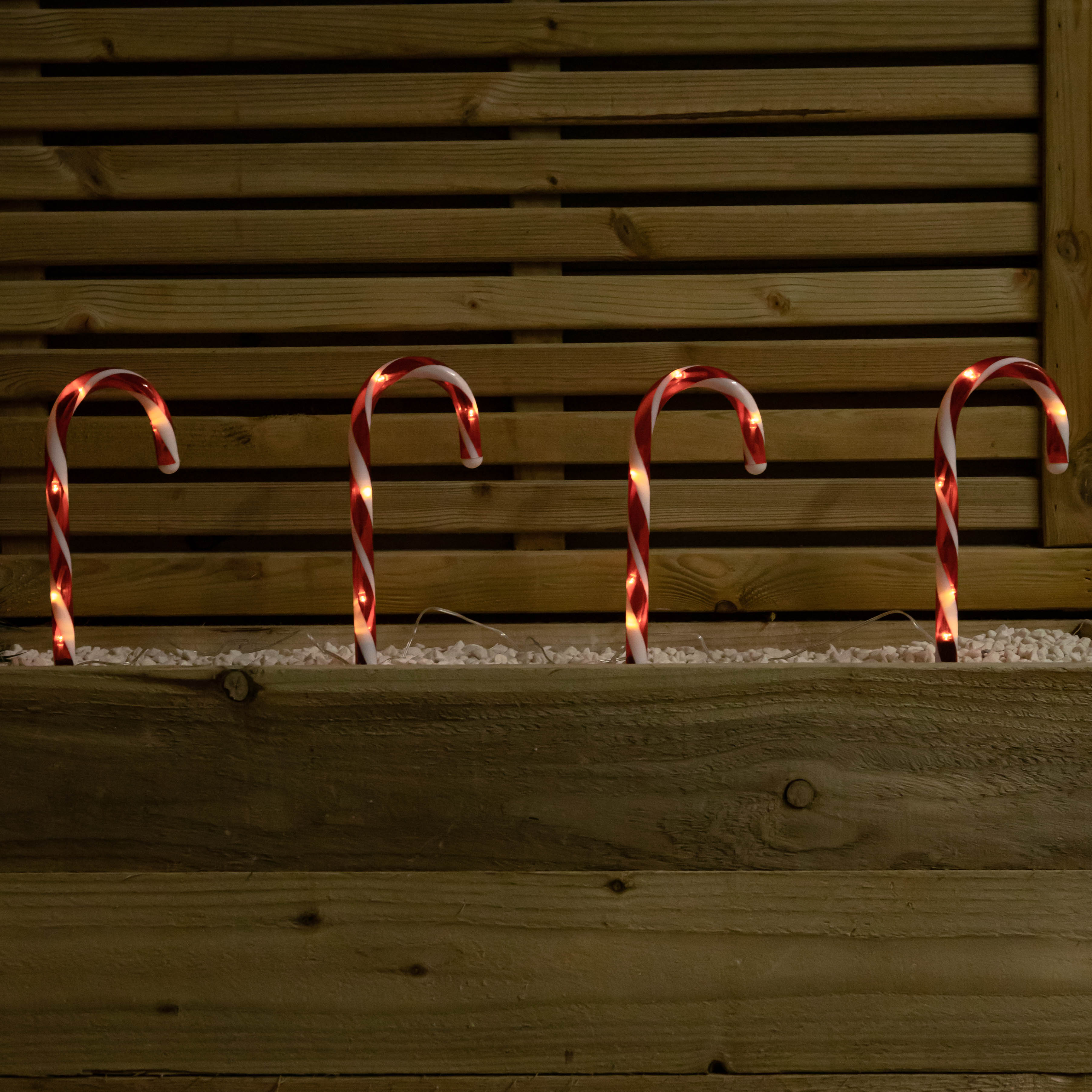 25cm Set of 12 Battery Powered Light up Christmas Candy Cane Path Lights with 60 Warm White LEDs