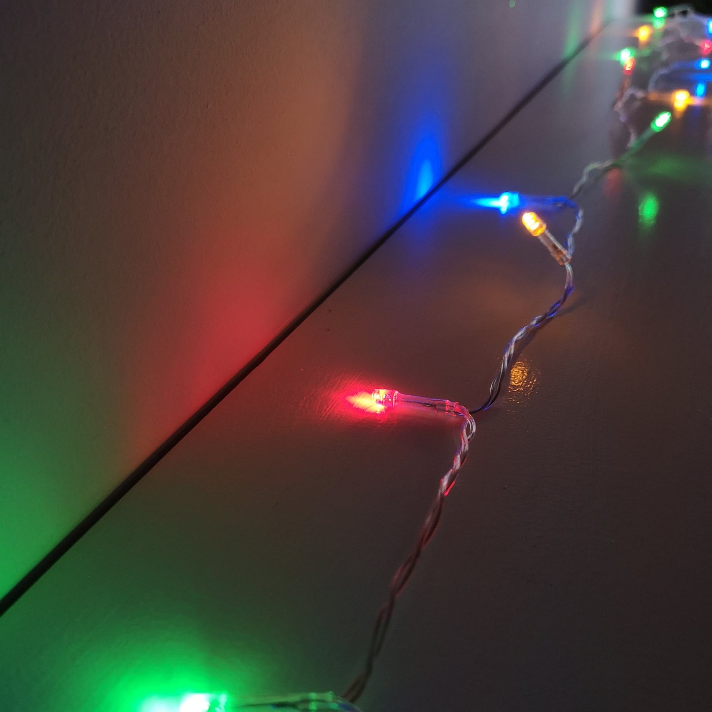 50 LED 5m Premier Christmas Outdoor Multi Function Battery Lights with Timer & Clear Cable in Multicoloured