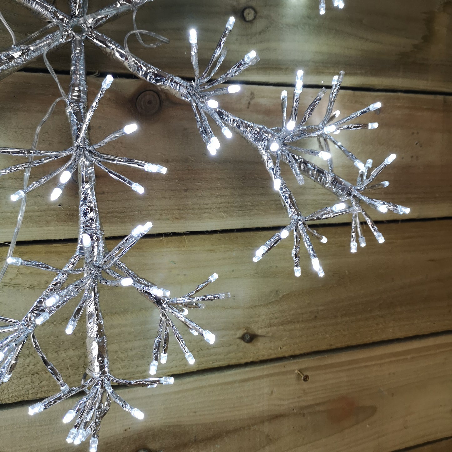 Premier 60cm Silver Starburst Snowflake Wall Window Decoration with 300 Warm White LEDs