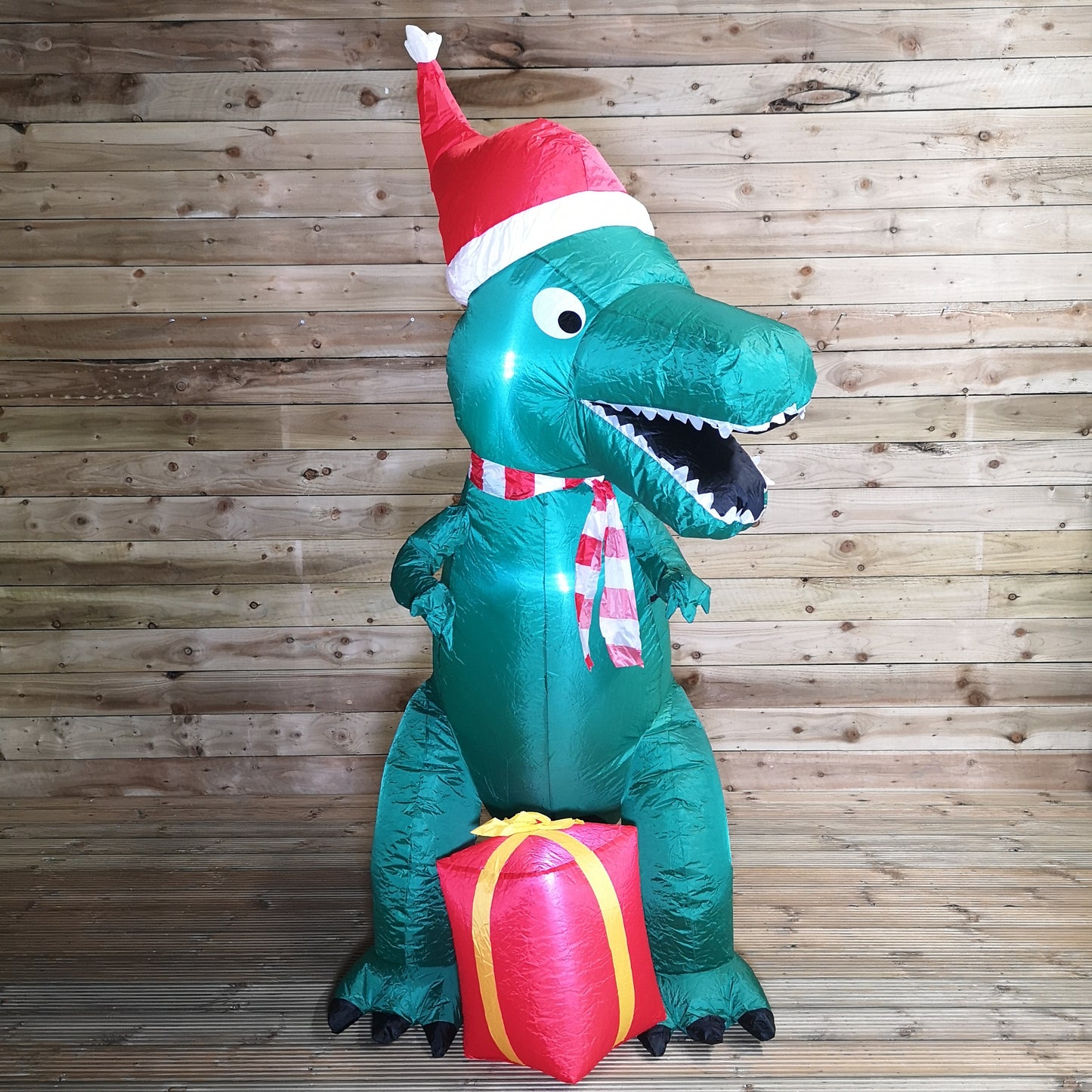 2.1m Premier Christmas Indoor Outdoor LED Inflatable T Rex Dinosaur in Santa Hat with Parcel